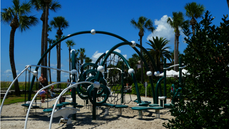 The playground at the Beach Club at The Cloister at Sea Island has the pool on one side, and the beach on the other.